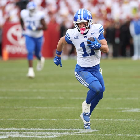 BYU Cougars wide receiver Parker Kingston (11) catches a pass against the Iowa State Cyclones at Jack Trice Stadium.