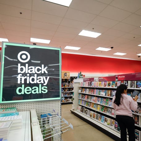 A woman shops at a Target store in Chicago on November 26, 2024, ahead of the Black Friday shopping day.