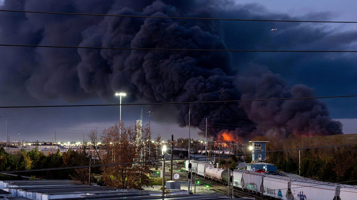 Smoke rises from the wreackage of a UPS MD-11 cargo jet after it crashed on departure from Louisville Muhammad Ali International Airport in Louisville, Kentucky, U.S. November 4, 2025.