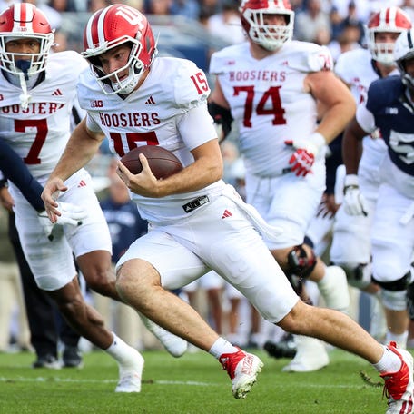 Indiana quarterback Fernando Mendoza runs for a touchdown during the first quarter against Penn State at Beaver Stadium on Nov. 8, 2025 in State College, Pa.