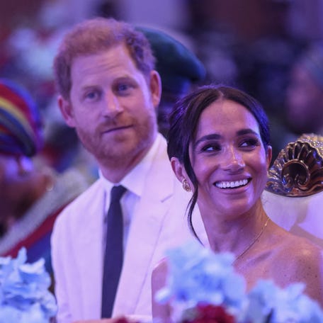 Prince Harry Britain's Meghan, Duchess of Sussex, attend a Sit Out at the Nigerian Defence Headquarters in Abuja on May 11, 2024, during celebrations for the Invictus Games anniversary.