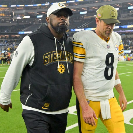 Nov 9, 2025; Inglewood, California, USA; Pittsburgh Steelers head coach Mike Tomlin and quarterback Aaron Rodgers (8) walk off the field after the game against the Los Angeles Chargers at SoFi Stadium. Mandatory Credit: Jayne Kamin-Oncea-Imagn Images