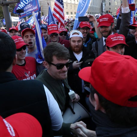 Supporters of President Donald Trump cheer on White supremacist Nick Fuentes at a protest in Washington, DC, on Nov.14, 2020.