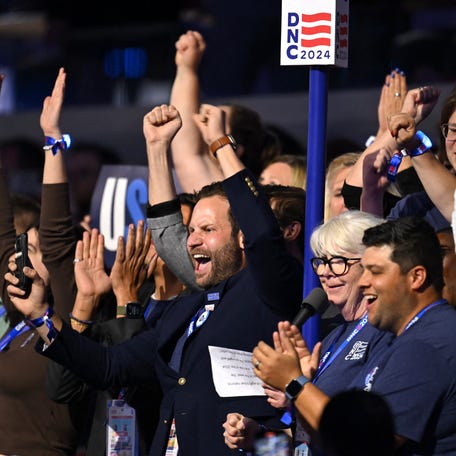 Utah delegation cast their vote during the ceremonial roll call vote on the second day of the Democratic National Convention (DNC) at the United Center in Chicago, Illinois, on August 20, 2024. Vice President Kamala Harris will formally accept the party's nomination for president at the DNC which runs from August 19-22 in Chicago.