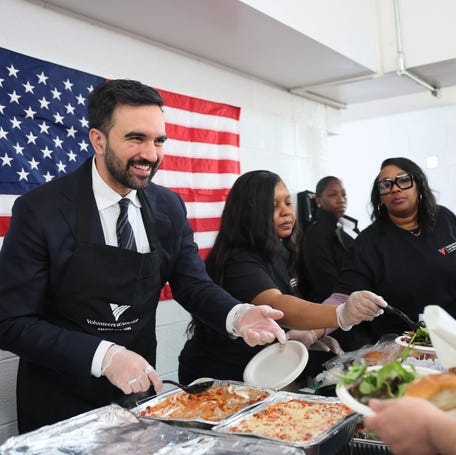 New York Mayor-elect Zohran Mamdani serves meals during a Veterans Day event on Nov. 11, 2025, in the Bronx borough.