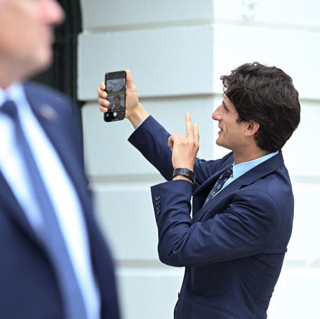 Jack Schlossberg, grandson of President John F. Kennedy, takes a selfie as President Joe Biden departs from the South Lawn of the White House in Washington, DC, on Sept. 6, 2024.