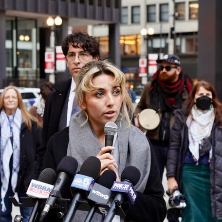 Democratic congressional candidate Kat Abughazaleh addresses supporters in Chicago after pleading not guilty Nov. 12, 2025, to charges filed in connection with a protest against the Trump administration's mass deportation campaign.