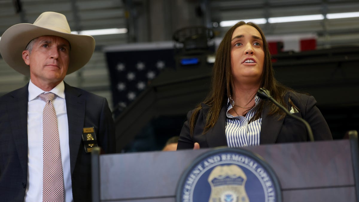 Mark Glass, commissioner of the Florida Department of Law Enforcement left, and Madison Sheahan, deputy director of the U.S. Immigration and Customs Enforcement, speak at the ICE Enforcement and Removal Operations center on Nov. 13, 2025, in Miramar.