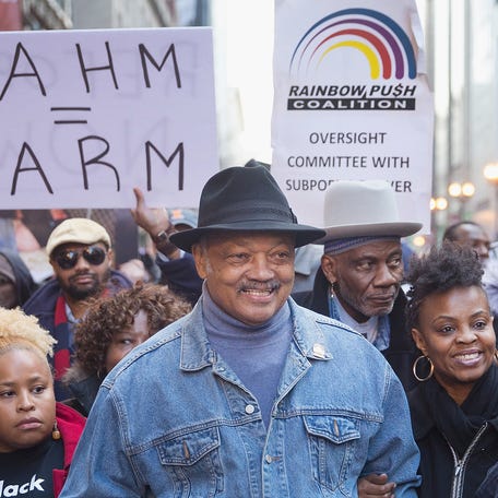 The Reverend Jesse Jackson, founder of the Rainbow PUSH Coalition, leads demonstrators in Chicago in 2015.