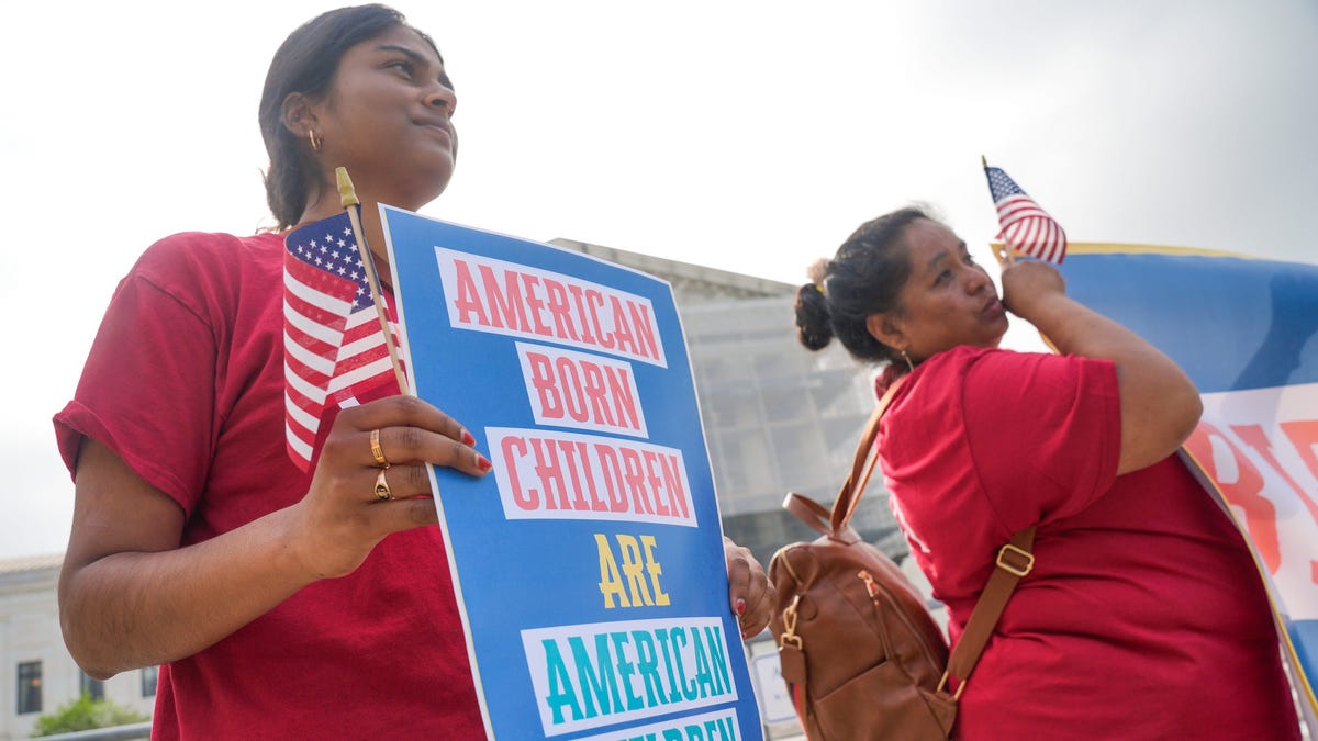 People demonstrated outside the Supreme Court before justices heard oral arguments in May on whether the court should reverse lower courts' efforts to block President Trump's executive order ending birthright citizenship.