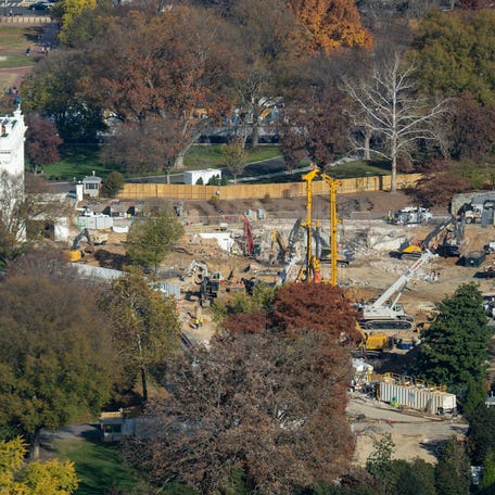 Construction crews continue to remove the East Wing of the White House and prepare for the new ballroom construction, from the newly reopened Washington Monument on November 14, 2025.