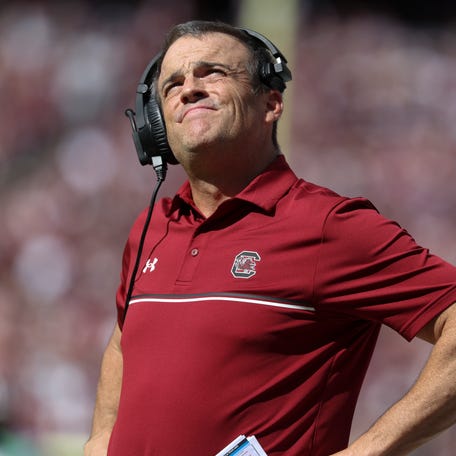 Nov 15, 2025; College Station, Texas, USA; South Carolina Gamecocks head coach Shane Beamer looks up during the second quarter against the Texas A&M Aggies at Kyle Field. Mandatory Credit: Troy Taormina-Imagn Images