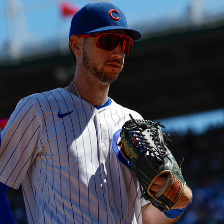 Aug 21, 2025; Chicago, Illinois, USA; Chicago Cubs right fielder Kyle Tucker (30) walks back to the dugout during the fifth inning of a baseball game against the Milwaukee Brewers at Wrigley Field. Mandatory Credit: Kamil Krzaczynski-Imagn Images