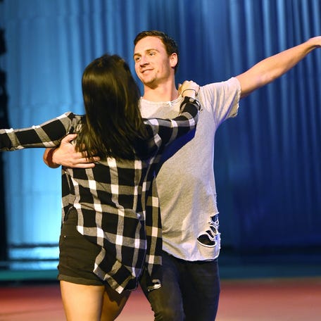 Cheryl Burke and Ryan Lochte rehearse for their "Dancing with the Stars" performance with the cast of "O by Cirque du Soleil" at the Bellagio on Sept. 30, 2016, in Las Vegas.