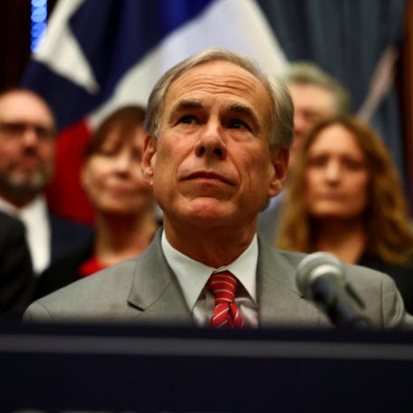 Texas Governor Greg Abbott looks on, during a press conference with U.S. Health and Human Services (HHS) Secretary Robert F. Kennedy Jr. (not pictured) at the State Capitol in Austin, Texas, U.S., August 28, 2025.