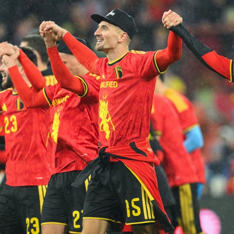 Belgium players celebrate after winning the FIFA World Cup 2026 Group J European qualification match between Belgium and Liechtenstein at the Maurice-Dufrasne stadium, in Liege, on Nov. 18, 2025.
