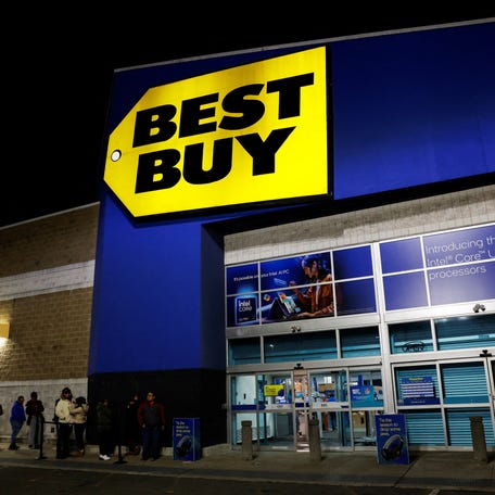 People stand in line outside a Best Buy store during a Black Friday sales event in Westbury, New York, U.S., November 29, 2024. REUTERS/Shannon Stapleton