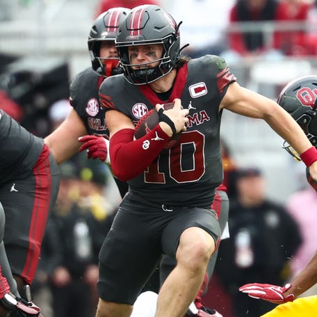 Oklahoma quarterback John Mateer (10) runs with the ball during the second half against Missouri at Gaylord Family-Oklahoma Memorial Stadium.