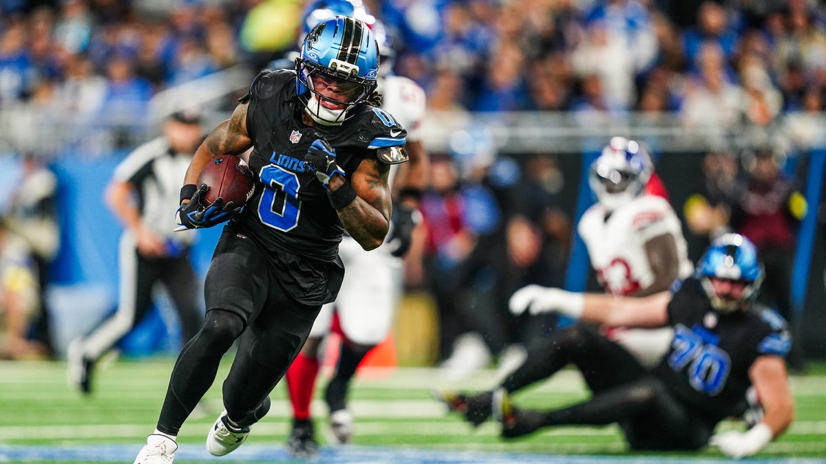 Lions rally to stun Giants, 34-27 in OT, stay in NFL playoff race Lions rally to stun Giants, 34-27 in OT, stay in NFL playoff race