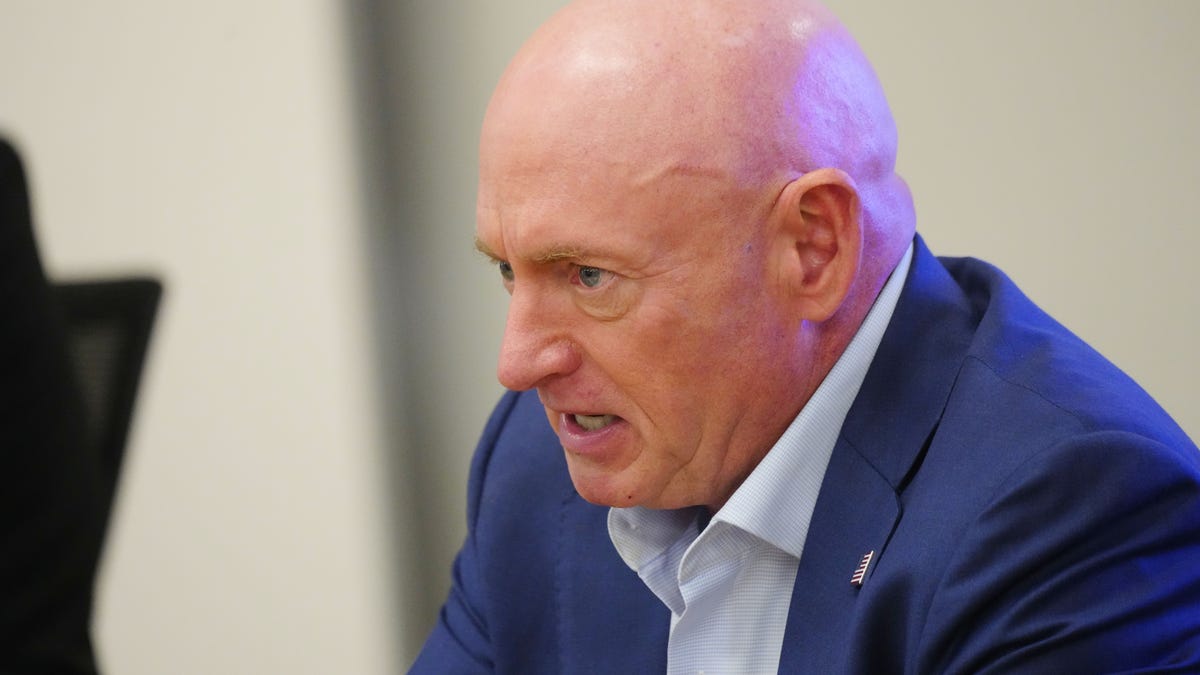 Sen. Mark Kelly speaks during a roundtable on extreme heat at his Phoenix office on July 11, 2025.