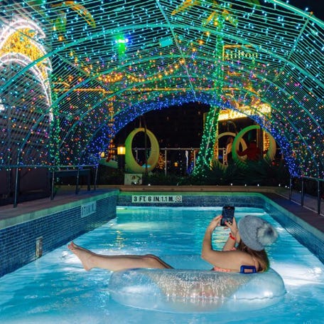 Float among the lights in the rooftop lazy river.