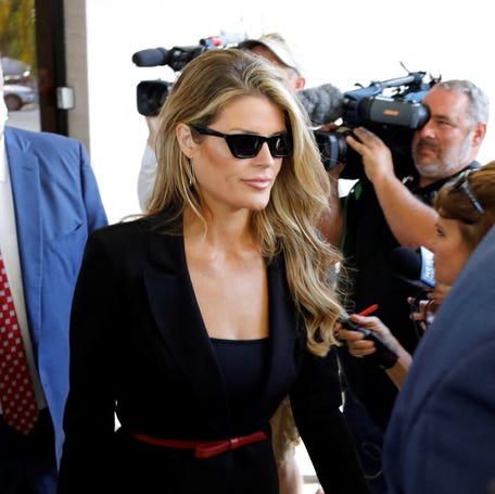 Lindsey Halligan, part of Donald Trump's legal team, leaves a federal courthouse in West Palm Beach, Florida, on Sept. 1, 2022.