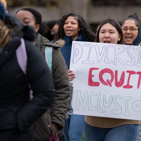 University of Louisville students holding a rally to protect diversity, equity, and inclusion (DEI) on their campus in March 2024.