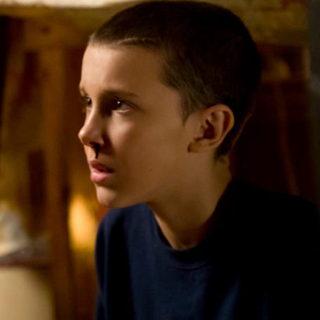 Finn Wolfhard, left, and Millie Bobby Brown in Season 1 of "Stranger Things."