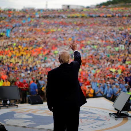 President Donald Trump waves after delivering remarks at the 2017 National Scout Jamboree in Summit Bechtel National Scout Reserve, West Virginia, on July 24, 2017.