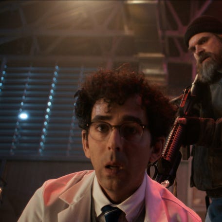 Jesse Gavin as Scientist, David Harbour as Jim Hopper and Millie Bobby Brown as Eleven in "Stranger Things" Season 5.