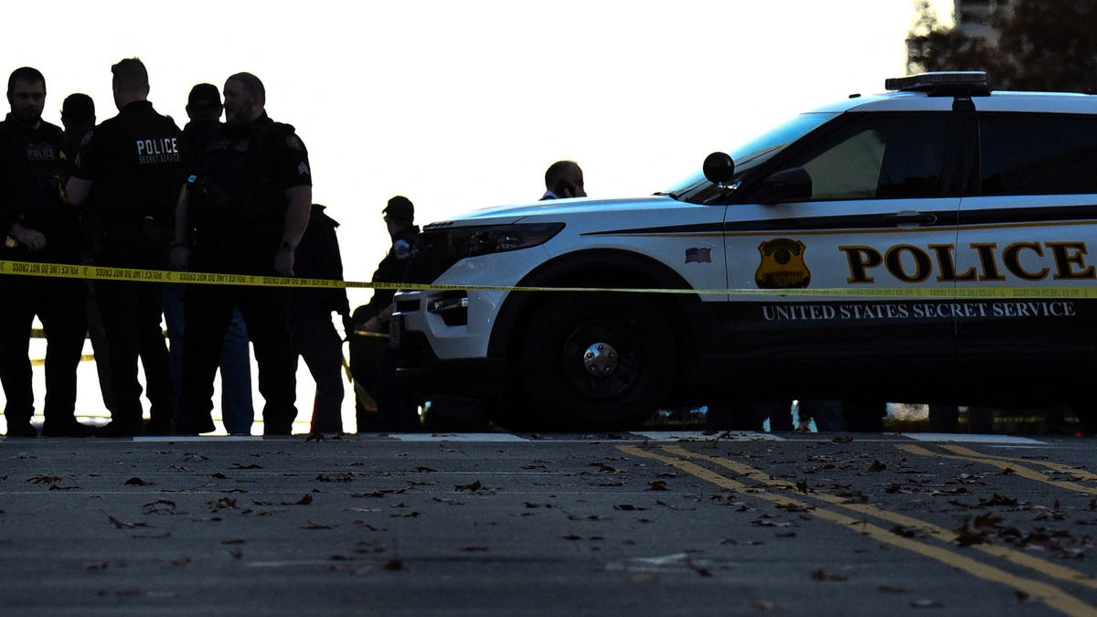 Law enforcement officers are pictured near the scene where two National Guard members were shot in Washington, D.C., on Nov. 26, 2025.