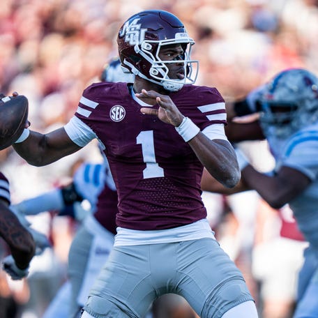 Mississippi State quarterback Kamario Taylor (1) passes the ball during a college football game between Mississippi State and Ole Miss at Davis Wade Stadium in Starkville, Miss., on Friday, Nov. 28, 2025. The Egg Bowl game marks the 122nd meeting between the two teams.