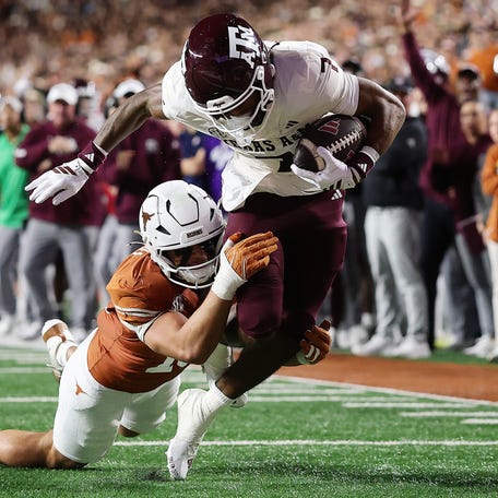 Texas A&M wide receiver KC Concepcion carries into the end zone for a touchdown during the second quarter against Texas at Darrell K Royal-Texas Memorial Stadium.