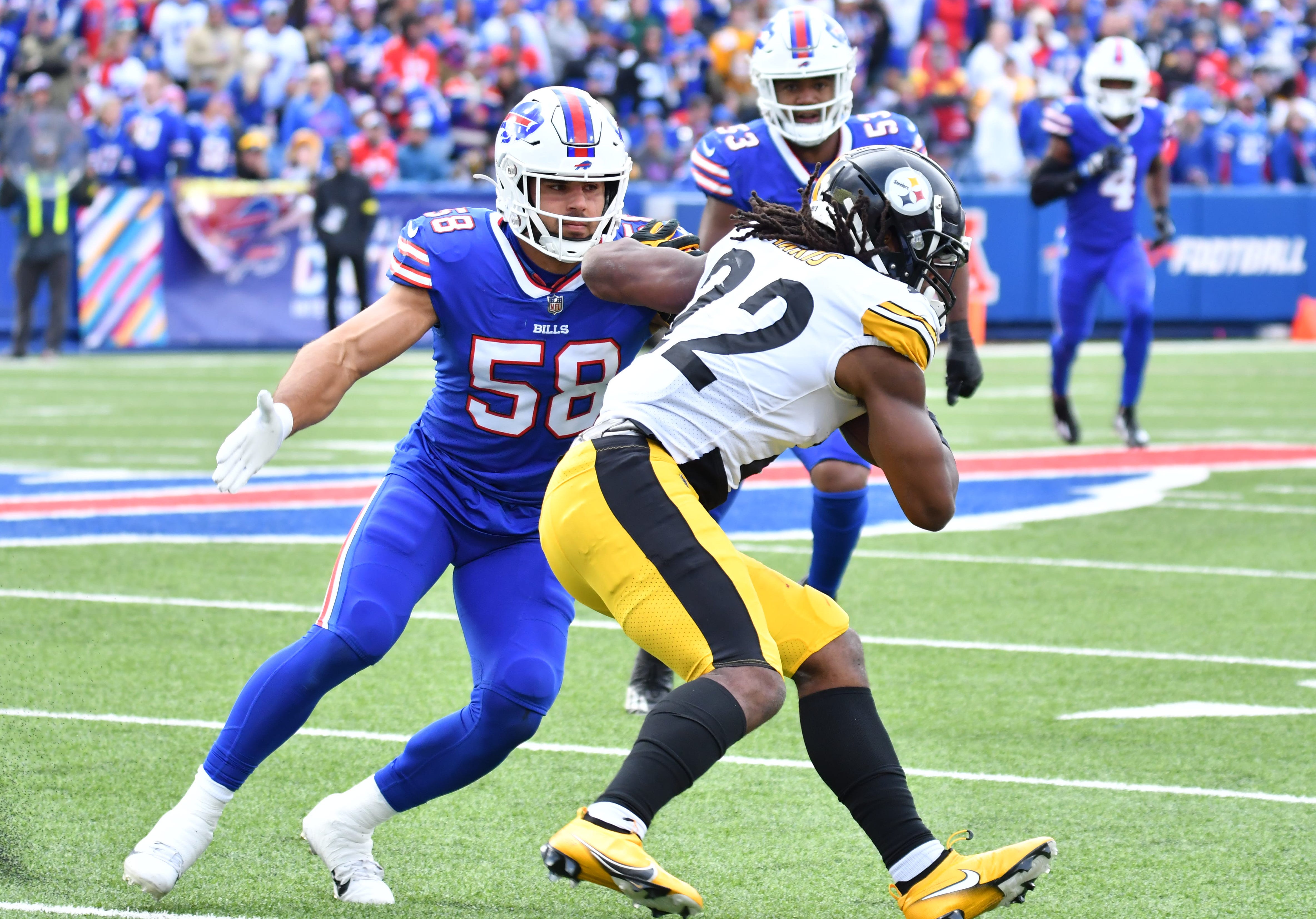Oct 9, 2022; Orchard Park, New York, USA; Buffalo Bills linebacker Matt Milano (58) prepares to tackle Pittsburgh Steelers running back Najee Harris (22) in the second quarter at Highmark Stadium. Mandatory Credit: Mark Konezny-USA TODAY Sports