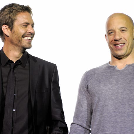 Vin Diesel and Paul Walker pose during a photocall ahead of the European premiere of "Fast & Furious" on March 17, 2009, in Germany.