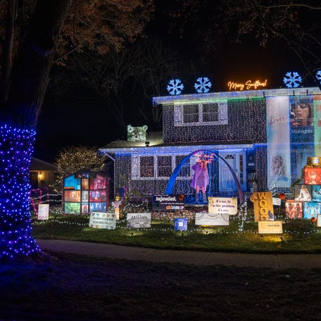 The Scott family's Taylor Swift-themed Christmas display lights up their Naperville, Illinois, home for a third year on Nov. 28, 2025.