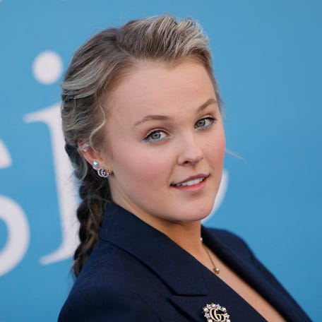 JoJo Siwa arrives for the 2025 Billboard Women in Music at Hollywood Park in Inglewood, California, on March 29, 2025.