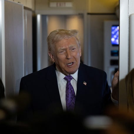 President Donald Trump speaks to reporters during travel to Washington, D.C., from Palm Beach International Airport, Florida, on November 30, 2025.