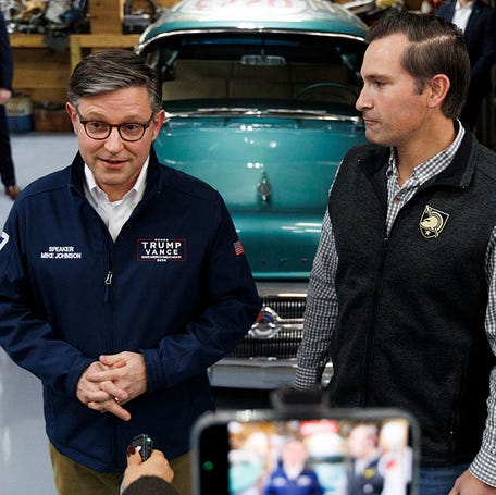 U.S. House Speaker Mike Johnson, left, and Republican congressional candidate Matt Van Epps speak to reporters at a campaign event on Dec. 1, 2025, in Franklin, Tennessee. A day later, Van Epps defeated Democrat Aftyn Behn to replace retired Republican U.S. Rep. Mark Green.
