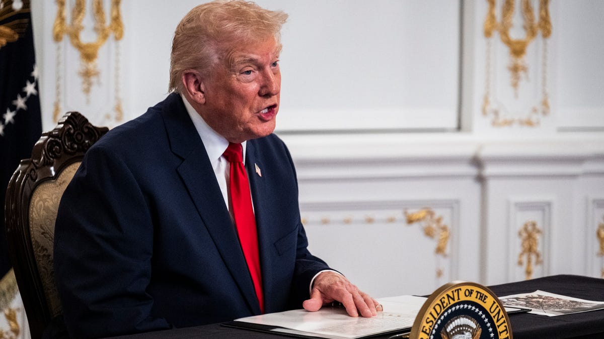 PALM BEACH, FLORIDA - NOVEMBER 27: President Donald Trump participates in a call with U.S. service members from his Mar-a-Lago club in Florida on Thanksgiving Day on November 27, 2025 in Palm Beach, Florida. (Photo by Pete Marovich/Getty Images)