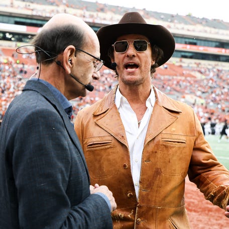 AUSTIN, TEXAS - NOVEMBER 01: Actor Matthew McConaughey speaks with Paul Finebaum prior to the game between the Vanderbilt Commodores and the Texas Longhorns at Darrell K Royal-Texas Memorial Stadium on November 01, 2025 in Austin, Texas. (Photo by Kenneth Richmond/Getty Images)