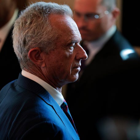 Health and Human Services Secretary Robert F. Kennedy Jr. exits after the signing ceremony for the "Fostering the Future" executive order in the East Room at the White House on Nov. 13, 2025 in Washington.