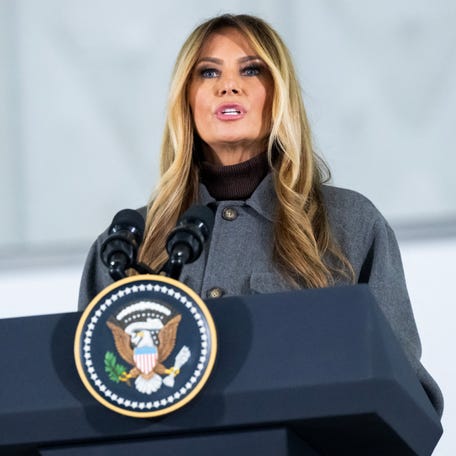 First Lady Melania Trump speaks prior to making care packages for deployed members of the US military during an American Red Cross holiday event with military families at Joint Base Andrews in Maryland, December 1, 2025.