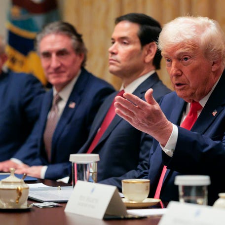 U.S. President Donald Trump speaks alongside (L-R) U.S. Secretary of Health and Human Services Robert F. Kennedy Jr., U.S. Interior Secretary Doug Burgum and U.S. Secretary of State Marco Rubio during a meeting of his Cabinet in the Cabinet Room of the White House on December 02, 2025 in Washington, DC.