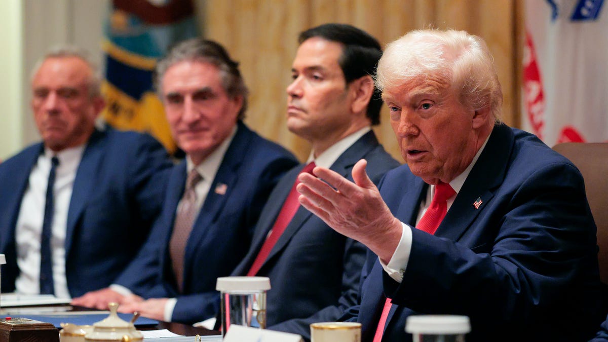 U.S. President Donald Trump speaks alongside (L-R) U.S. Secretary of Health and Human Services Robert F. Kennedy Jr., U.S. Interior Secretary Doug Burgum and U.S. Secretary of State Marco Rubio during a meeting of his Cabinet in the Cabinet Room of the White House on December 02, 2025 in Washington, DC.