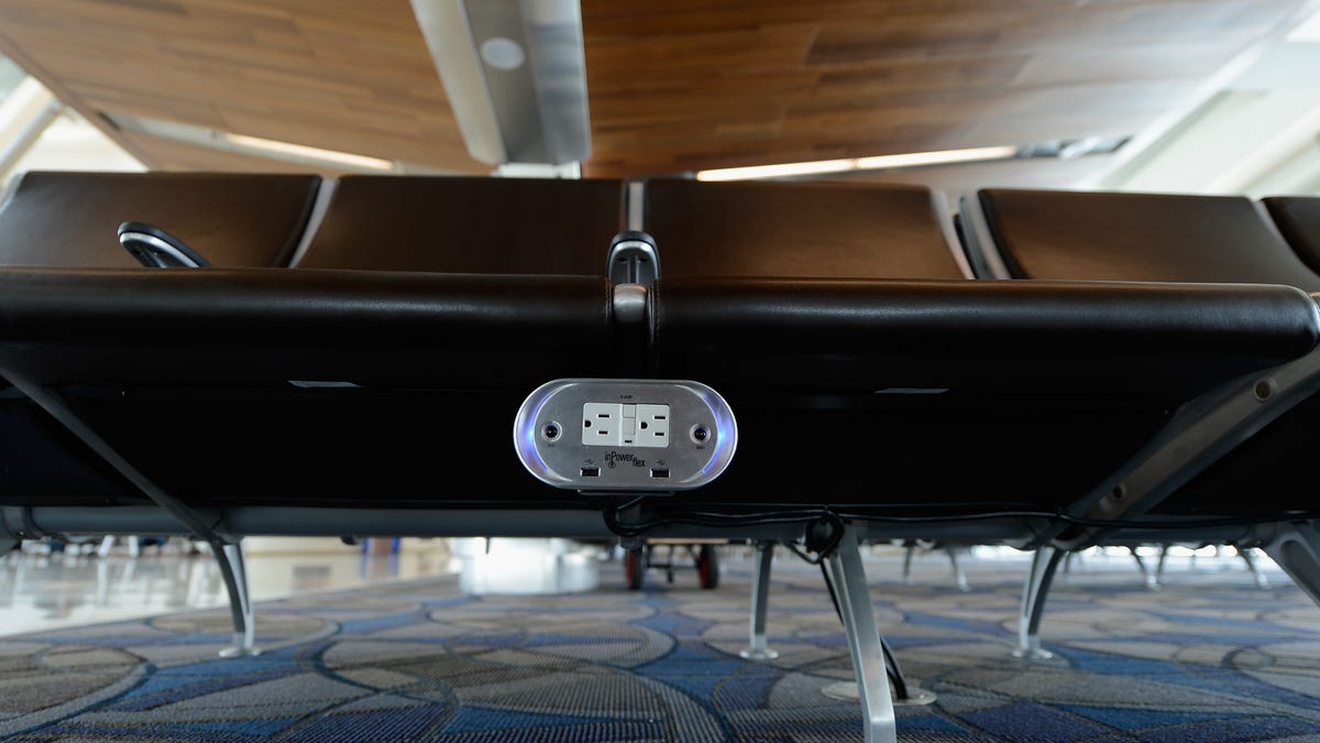 Many airports, like Los Angeles International Airport, offer power outlets easily within travelers' reach.