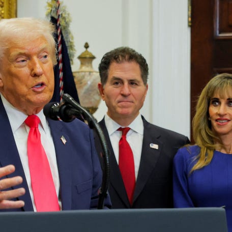 President Donald Trump makes an announcement about "Trump accounts", accompanied by CEO of Dell Technologies Michael Dell and his wife Susan Dell, in the Roosevelt Room at the White House in Washington, D.C., U.S., December 2, 2025.