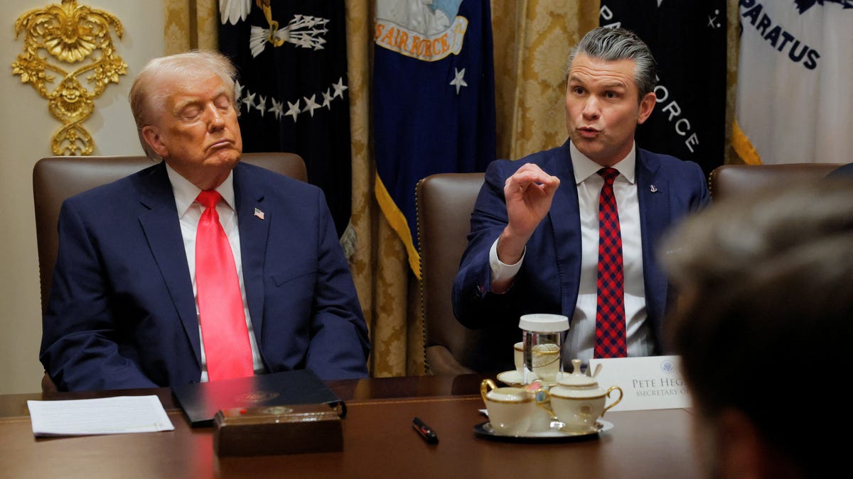 Defense Secretary Pete Hegseth speaks during President Donald Trump's Cabinet meeting at the White House in Washington, DC, on Dec. 2, 2025.