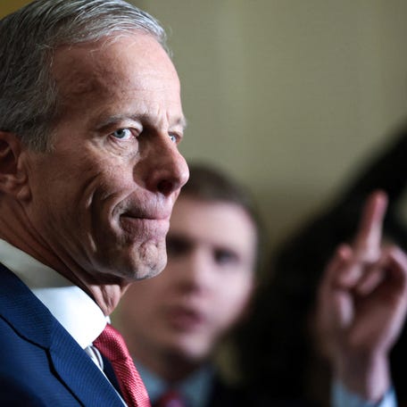 Senate Majority Leader John Thune addresses reporters after the weekly Senate Republican caucus policy luncheon at the Capitol in Washington on Dec. 2.