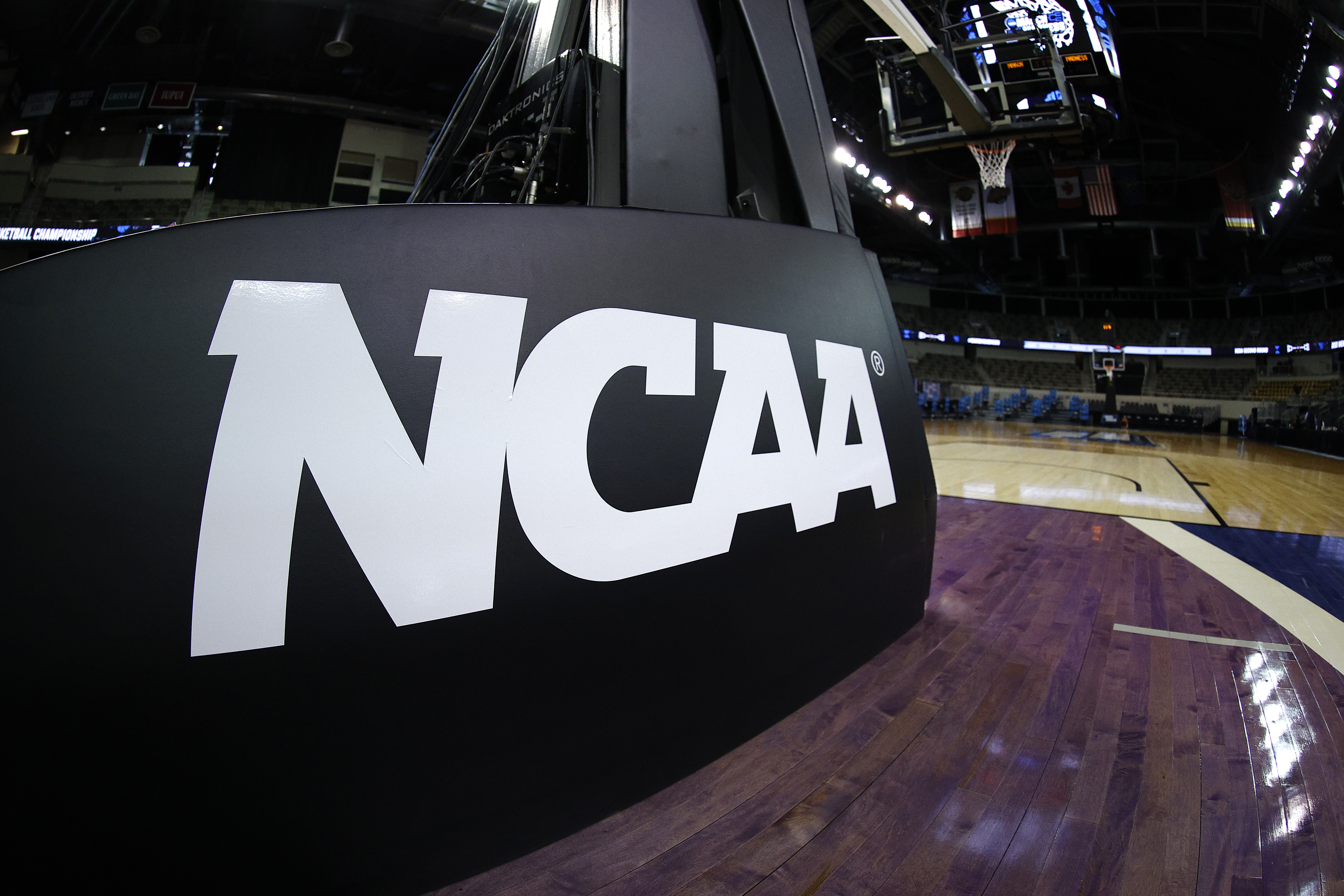INDIANAPOLIS, INDIANA - MARCH 21: The NCAA logo is seen on the basket stanchion before the game between the Oral Roberts Golden Eagles and the Florida Gators in the second round game of the 2021 NCAA Men's Basketball Tournament at Indiana Farmers Coliseum on March 21, 2021 in Indianapolis, Indiana. (Photo by Maddie Meyer/Getty Images)